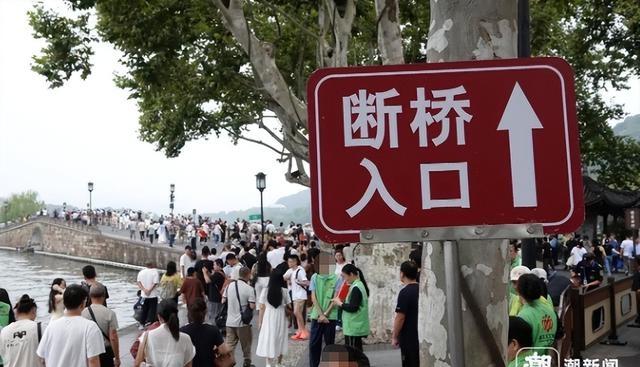 国庆变“国庆劫”！44万人挤西湖，高速充电排队4小时！-有驾